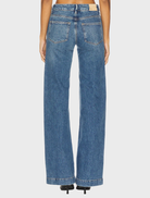 Medium blue Diesel jeans labeled Lennah W Mini Patch PKT - Coventry displayed in a flat lay arrangement.