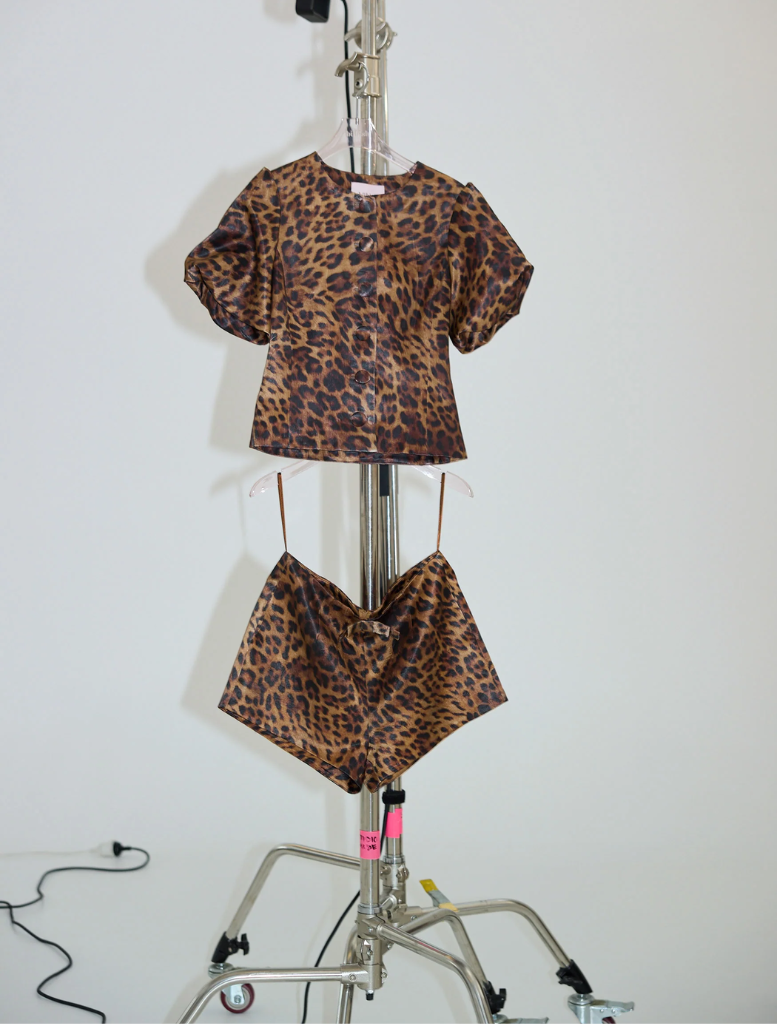Soft, stretchy leopard print shorts, named Penelope Bow Hot Short, perfect for casual wear.