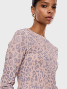Elegant long sleeve top in a leopard print, combining comfort with a chic, modern look.