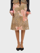 Fashionable midi skirt in mesh with a striking leopard print, perfect for adding flair to any wardrobe.