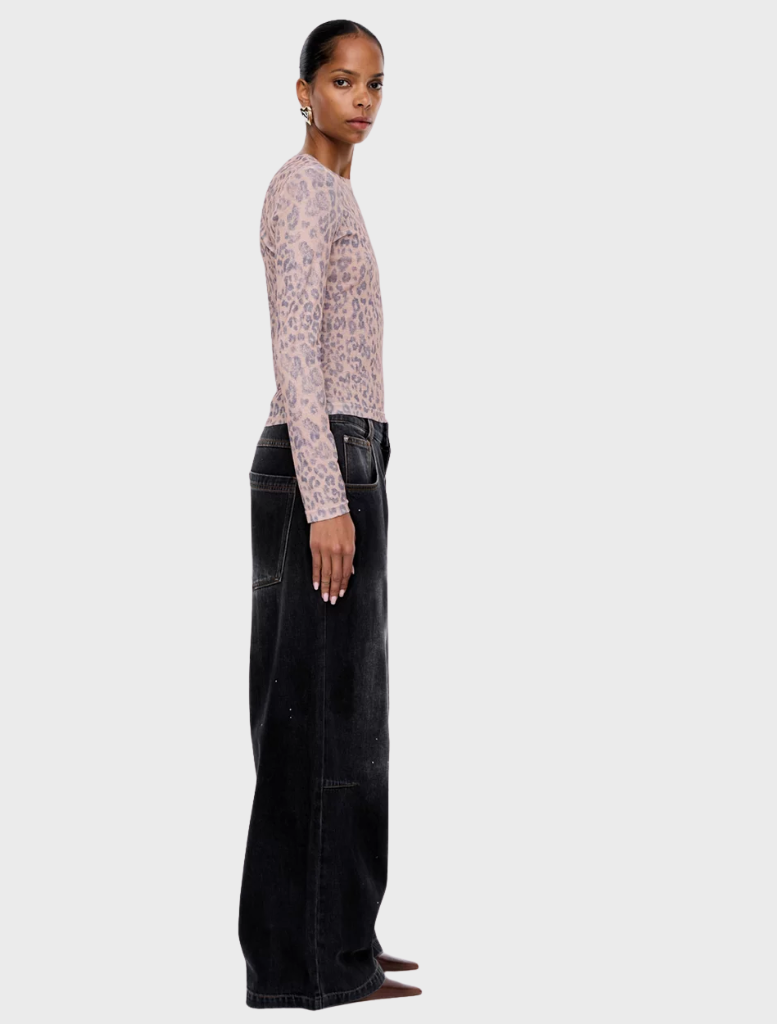 Stylish long sleeve top with a leopard print pattern, perfect for adding flair to any outfit.