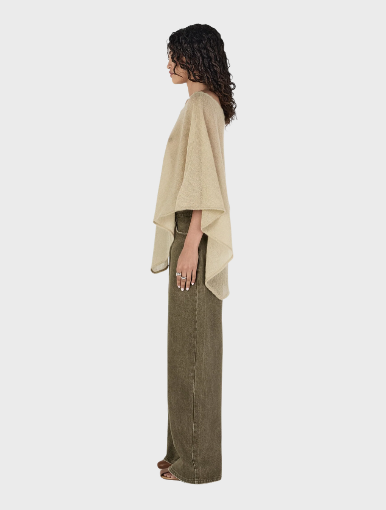  Pistachio-colored Simona Poncho, showcasing a modern and elegant style for versatile wear.