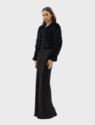 Elegant black Lola Crop Jacket, tailored for a flattering fit, suitable for various styles and events.