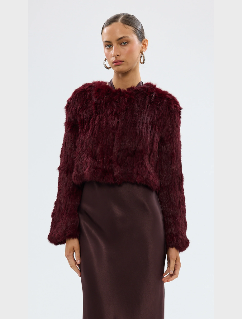 Wine-colored Lola crop jacket with a stylish design, perfect for layering in cooler weather.