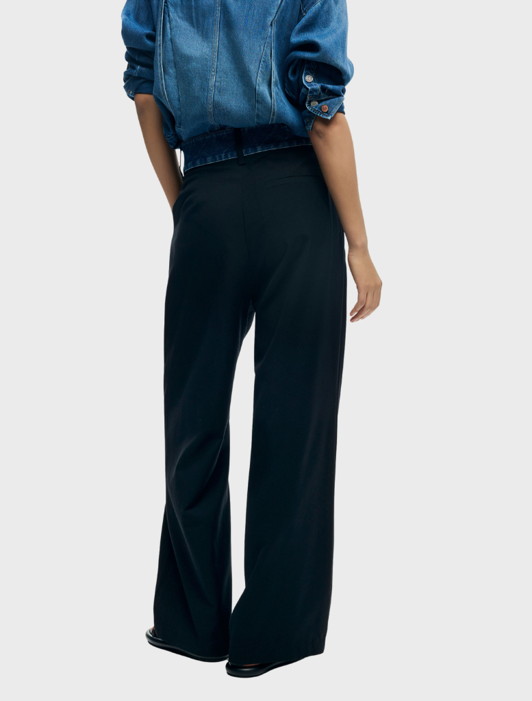 Classic solid long trousers, offering a sleek silhouette perfect for everyday wear or more formal occasions.