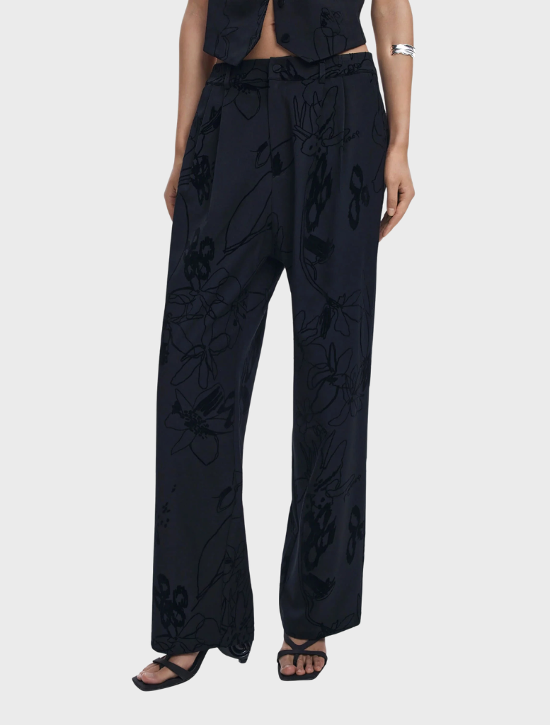 Black long trousers displayed on a white background, showcasing a sleek and modern design suitable for various occasions.