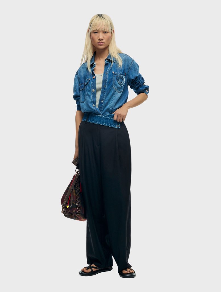 Solid long trousers in a neutral color, featuring a straight-leg design suitable for casual or formal wear.