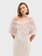 Lottie Wrap in blush, made from upcycled Marabou Feather, features a double hook-and-eye closure and satin lining.