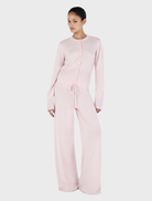 Lucielle Cashmere Cardigan in blush color, featuring a cozy design and delicate texture, perfect for layering.