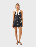 Lucille Mini Dress by Riviera, featuring a stylish design with a fitted silhouette and vibrant colors for a chic look.