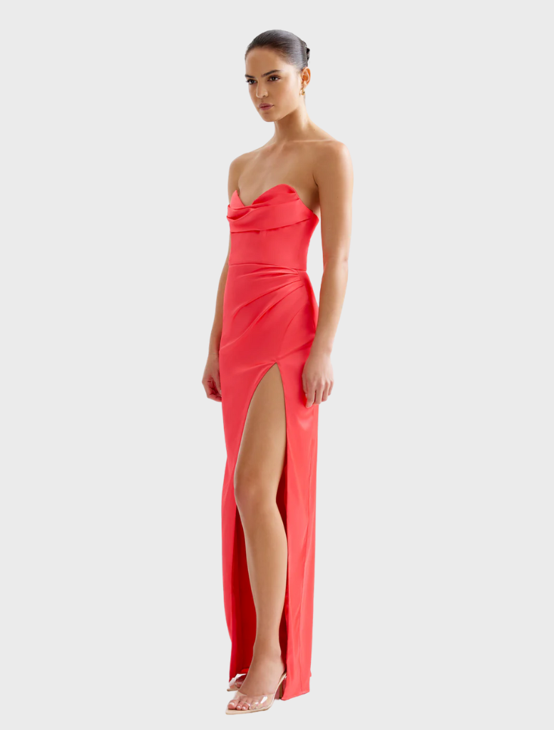 Stylish cranberry Lucy dress with a defined waist and a full skirt, suitable for both casual and dressy occasions.

