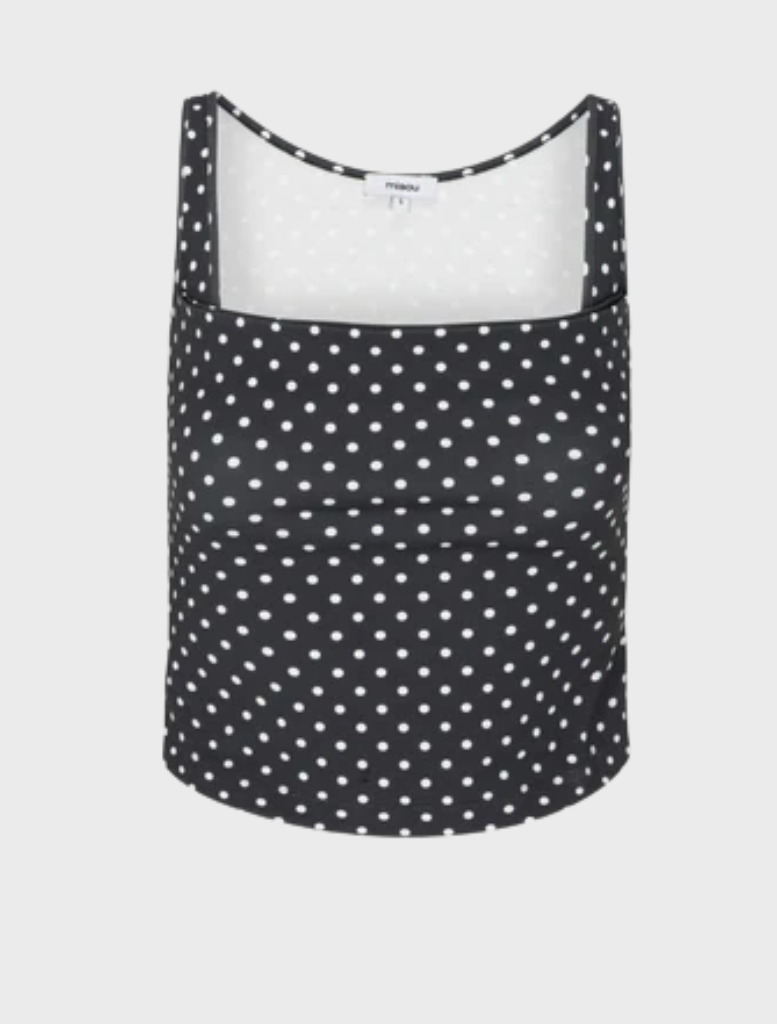 Elegant black top adorned with small white dots, perfect for versatile styling options.