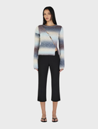  Elegant asymmetrical cardigan in a rich cocoa gradient, designed for comfort and a chic layered appearance.