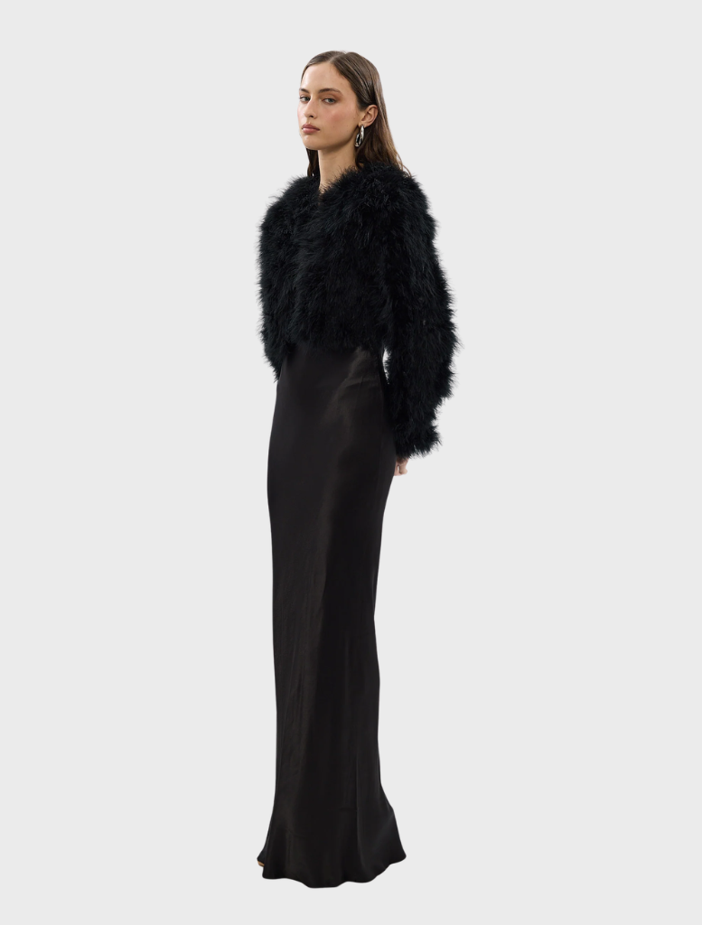 Black Manhattan crop jacket with a sleek design, ideal for adding a chic touch to any outfit.