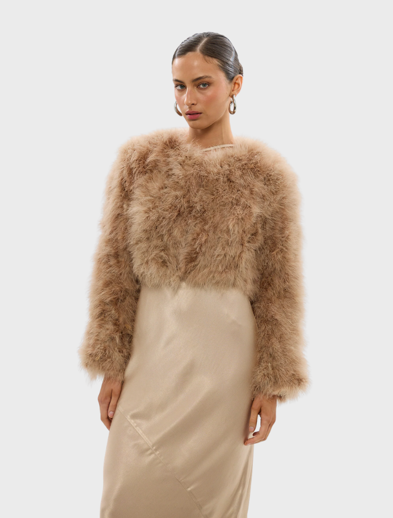 Toffee-colored Manhattan crop jacket with a stylish design, perfect for layering in cooler weather.