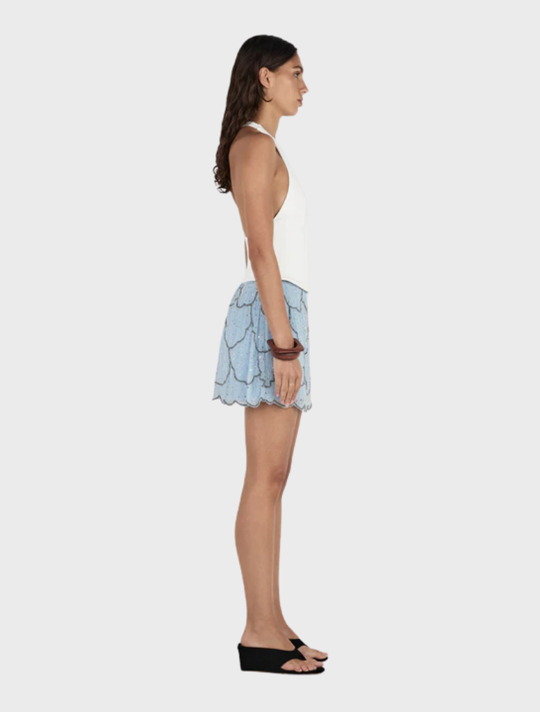 Chic cornflower blue mini skirt with intricate beadwork by Marais, ideal for adding flair to any outfit.