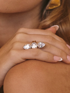 The Marais Triple Statement Ring showcases a diamond design with three stones in gold and white gold.