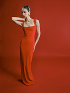 Long, strapless cherry red Marbella gown featuring a square neckline.