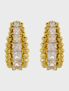 Gold Marilyn earrings featuring a stylish design, perfect for adding elegance to any outfit.