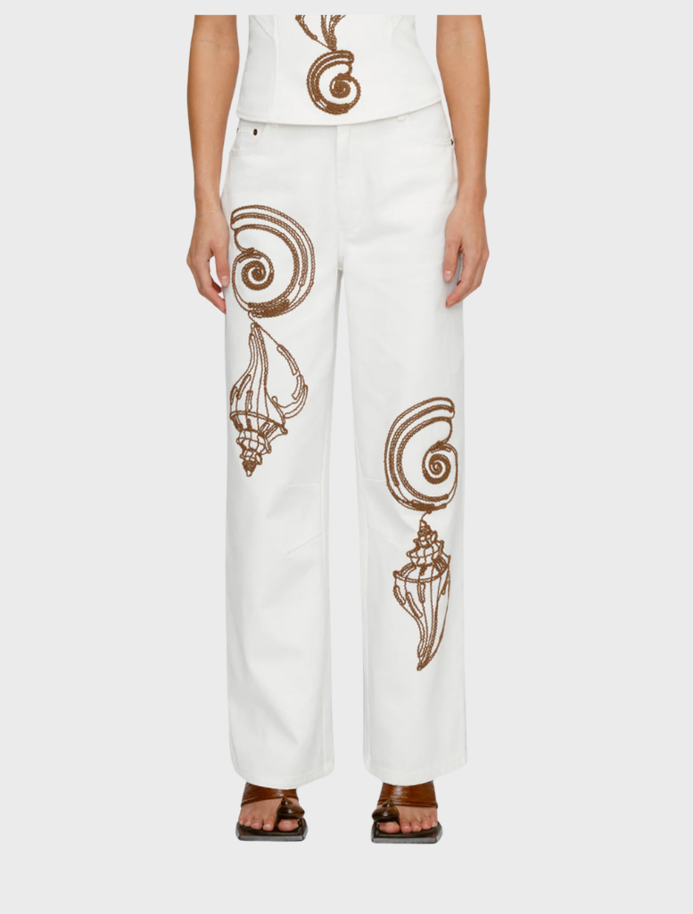 Maurie Jean dress in ivory, featuring a sleek design and elegant silhouette suitable for formal occasions.