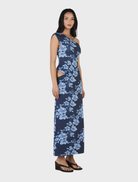 Flowing navy maxi dress with a unique rolling waves print, perfect for casual or formal occasions.