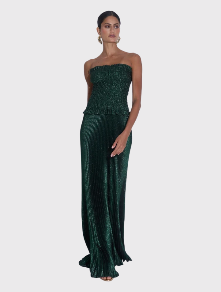 Elegant Maya Gown with strapless design, ruched bodice, and pleated skirt, perfect for special events and timeless style.