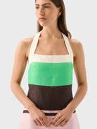 Elegant Maya Halter Mini Dress showcasing a striking tango stripe pattern, suitable for casual and festive occasions.