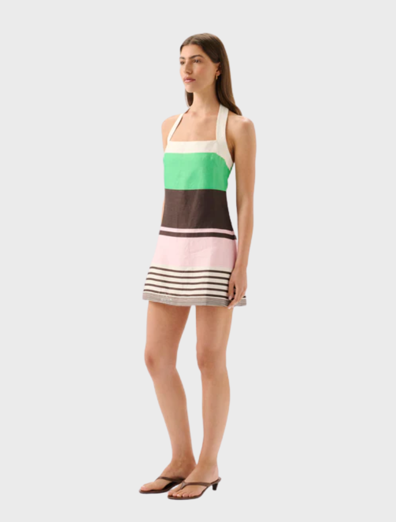 Stylish Maya Halter Mini Dress with a bold tango stripe design, ideal for warm weather and social gatherings.