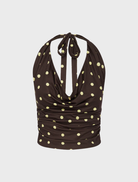 Chocolate and lemon polka dot Melody Halter Cowl Top, designed for a fashionable and elegant look.