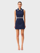 Blue Melody Jacquard Mini Dress featuring a fitted silhouette and elegant fabric texture, perfect for stylish occasions.