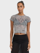 Black lattice mini tee featuring a stylish design, perfect for casual wear or layering in various outfits.