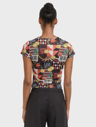 Mini tee with a playful casino design, featuring colorful dice and playing cards.