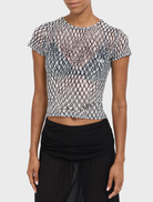 Black mini tee with a unique lattice design, offering a trendy look for various occasions and outfits.