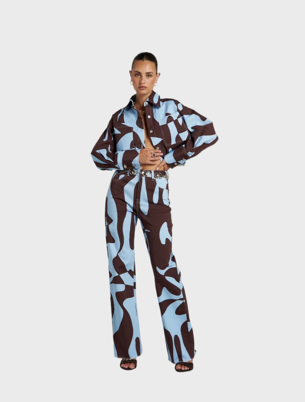 High-waisted Easy Jean with straight leg design, showcasing hand-drawn Mirage artwork inspired by altered realities.