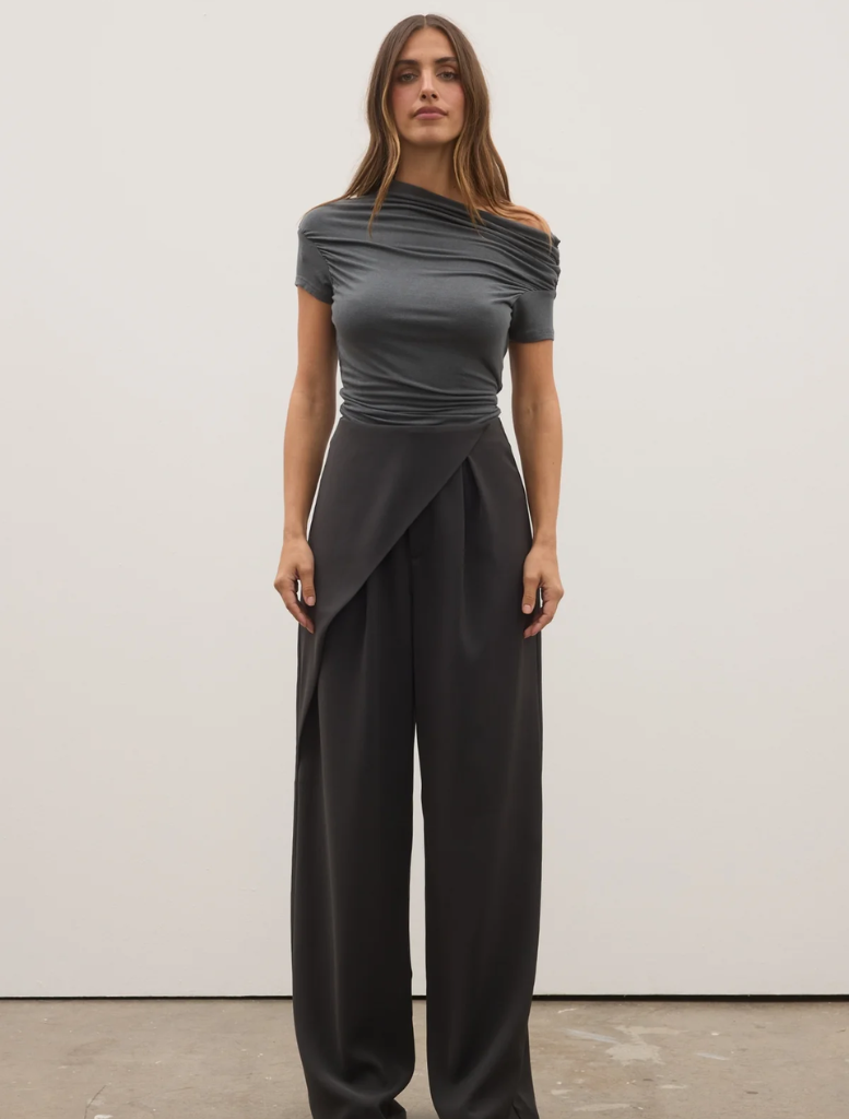 Casual dark heather grey Monica top hanging, highlighting its comfortable design and versatile color.