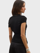 Monica Top in a sophisticated Shadow shade, highlighting a contemporary design for a chic and polished appearance.