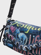 A vibrant Pizzicato Zarau Bag with a striking multicolor design, perfect for adding flair to any outfit.