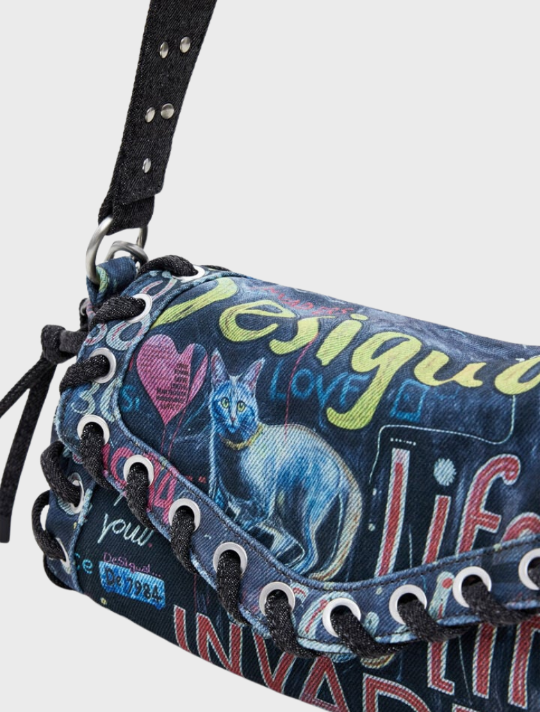 A vibrant Pizzicato Zarau Bag with a striking multicolor design, perfect for adding flair to any outfit.