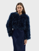 Stylish navy Manhattan Crop Jacket with a fitted silhouette, ideal for adding a chic touch to any outfit.