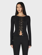 Black Nina Cardi Top displayed on a hanger, featuring a stylish design suitable for casual or formal wear.
