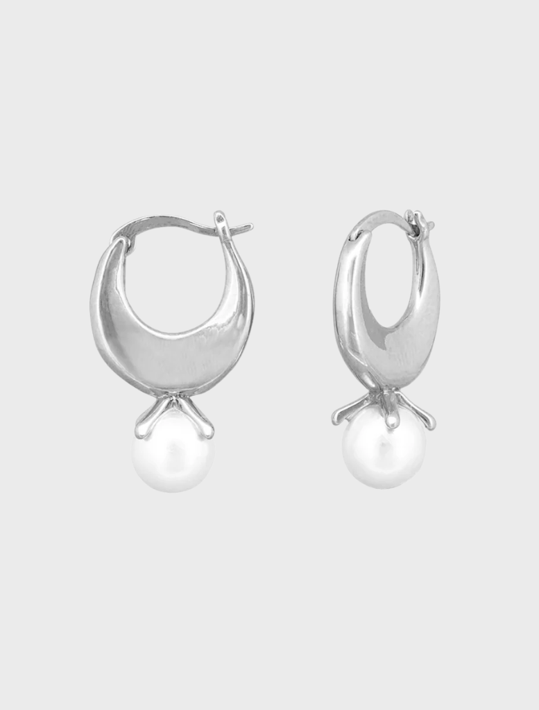 Nisha Hoops in silver, showcasing a stylish design with intricate detailing and a modern aesthetic.