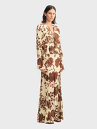 Noa Panelled Maxi Skirt adorned with a Pineapple Wallflower motif, offering a chic and breezy silhouette.