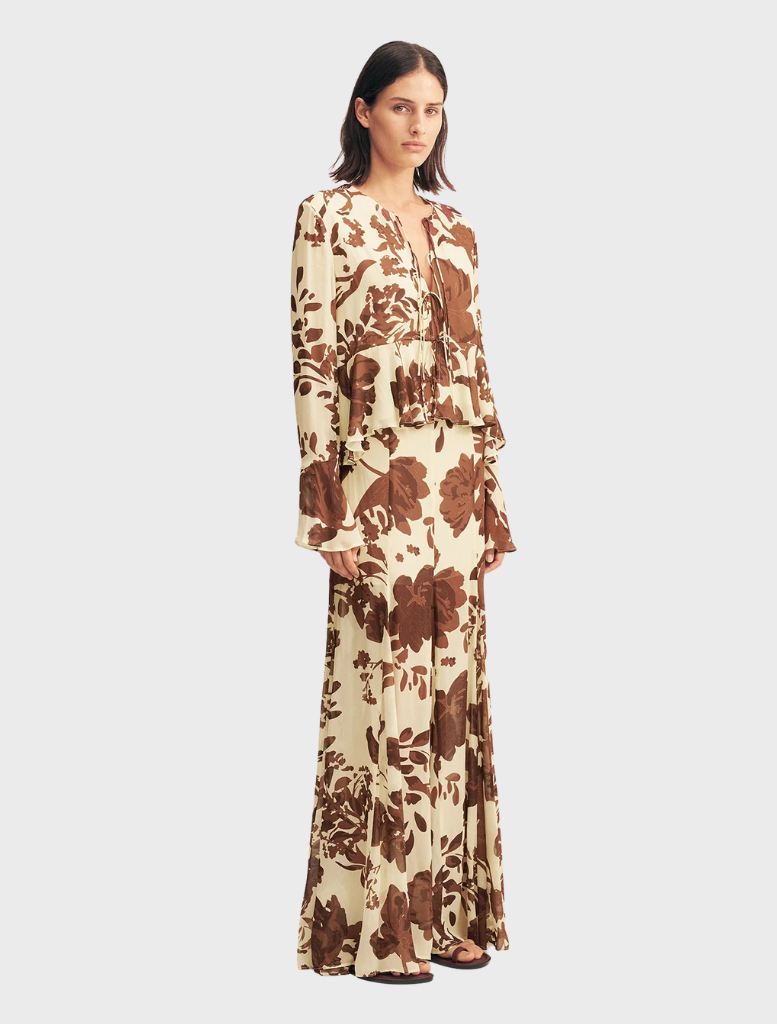 Noa Panelled Maxi Skirt adorned with a Pineapple Wallflower motif, offering a chic and breezy silhouette.