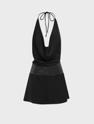 Chic black mini dress by Novalie, featuring a halter neck and cowl detail, ideal for a fashionable night out.