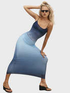 Elegant Arabella midi dress in an ocean gradient, showcasing a blend of blue and green tones in a flowing design.