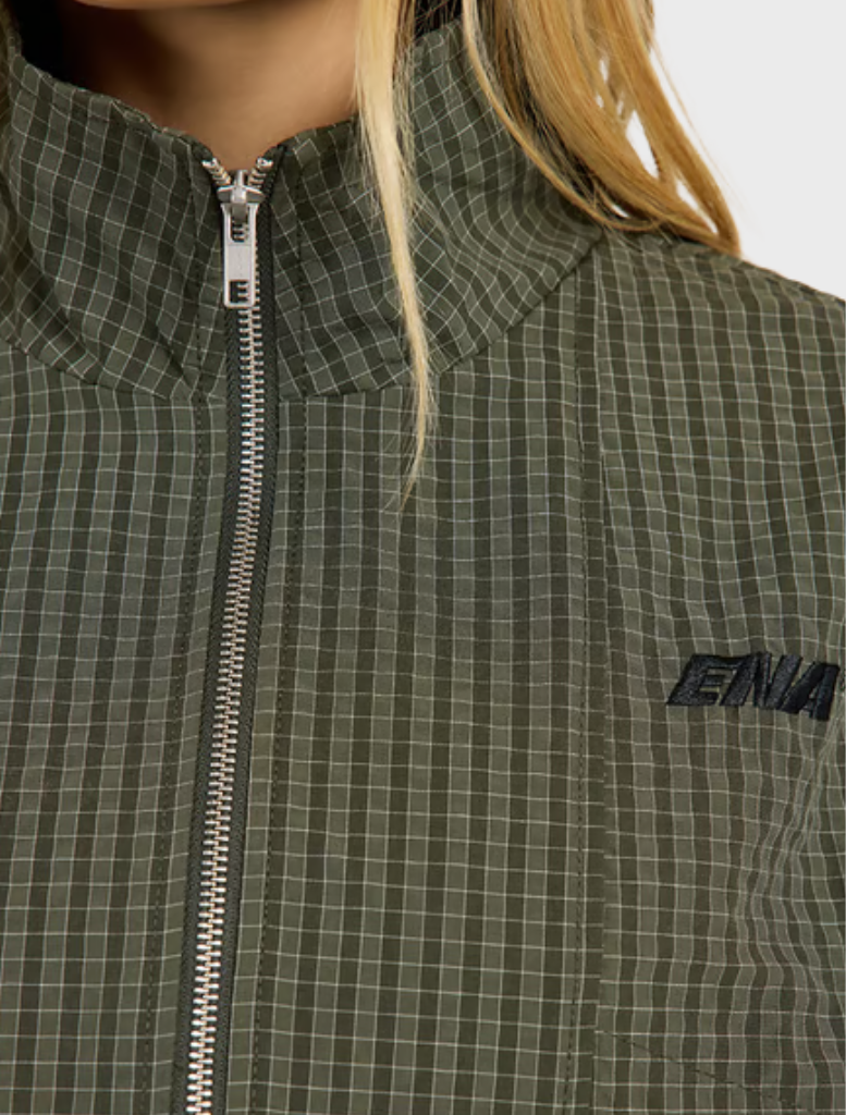 Ena Pelly Fallon jacket in olive check, designed with a funnel neck, two-way zip, and angled pockets for a refined look.