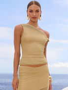 Chic gold one-shoulder top, offering a trendy look for special occasions or fashionable everyday wear.