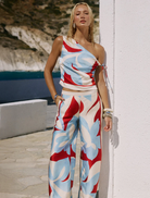 Amoree One Shoulder Tie Top, colored in striking Amoree Red, designed with a fashionable one-shoulder and tie detail.