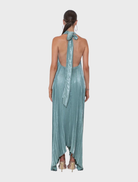 Timeless evergreen gown with intricate pleating, showcasing a luxurious shimmer ideal for grand evening occasions.