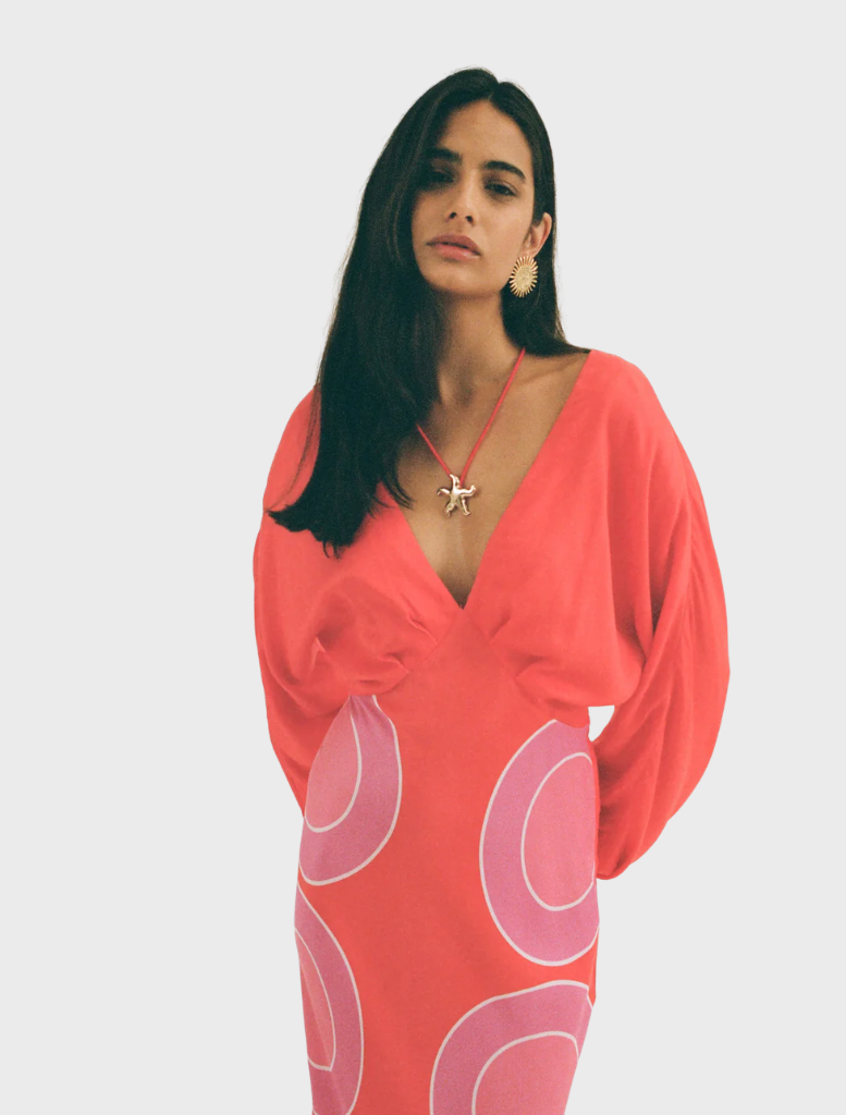 Stylish orange long sleeve maxi dress, designed for comfort and versatility in any wardrobe.